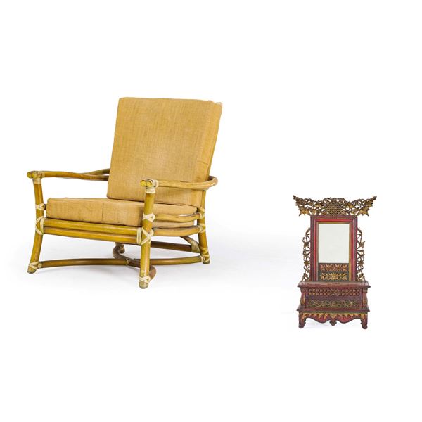 Un mobile toilette di gusto orientale e una poltrona in bamboo. XX secolo