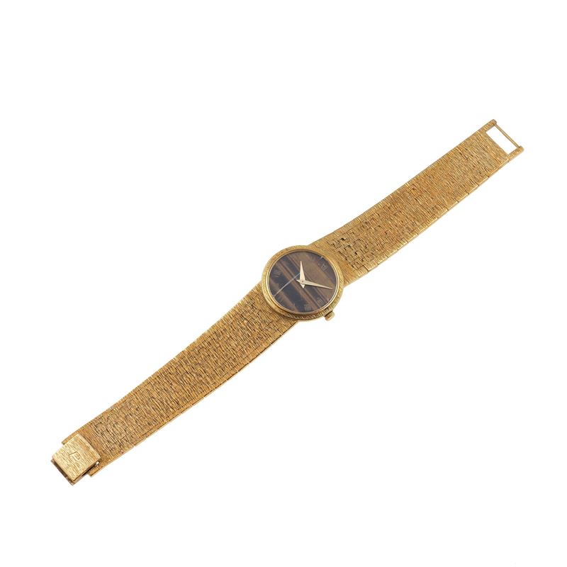 Piaget, orologio da polso con occhio di tigre  - Asta Gioielli, argenti, arredi e oggetti d'arte. Un lascito per finalità benefiche - I - Cambi Casa d'Aste