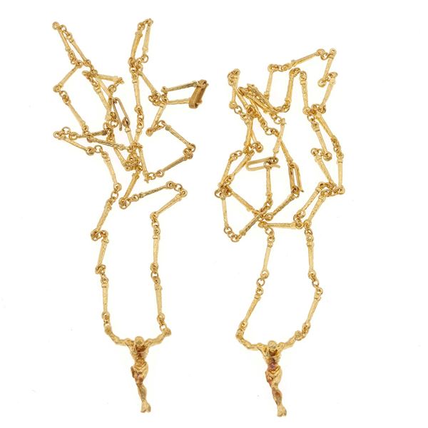 "Christo De San Juan De La Cruz", two gold necklaces. Signed and numbered Dalì n. A 131/1000 and A 137/1000