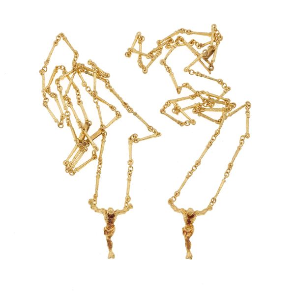 "Christo De San Juan De La Cruz", two gold necklaces. Signed and numbered Dalì, n. A 127/1000 and A 135/1000