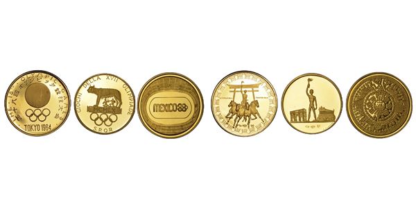 VARIE. Lotto di tre medaglie in oro.