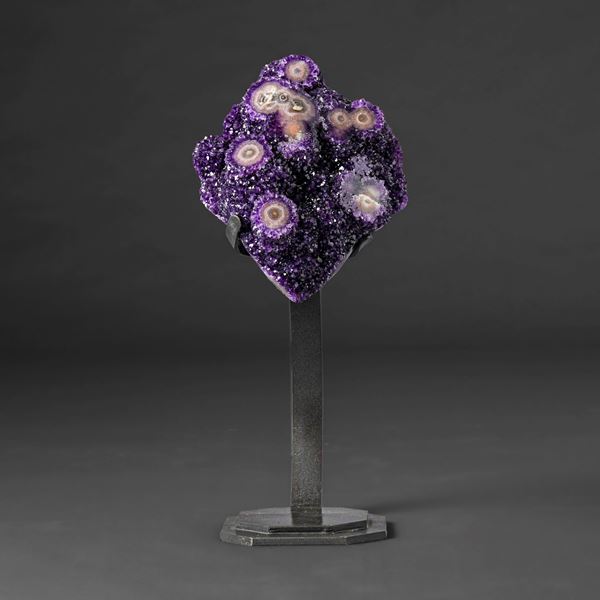 Large amethyst druse on a metal base