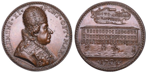 STATO PONTIFICIO. CLEMENTE XI (Giovanni Francesco Albani), 1700-1721. Medaglia in bronzo 1704 (A. IV). Il palazzo dell'Annona a Roma.