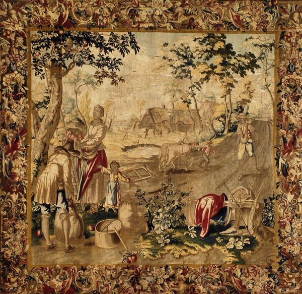 Manifattura Fiamminga del XVII secolo Scena di vita contadina con ricca bordura floreale