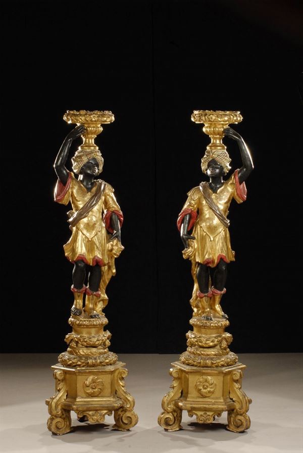 Coppia di moretti in legno laccato e dorato, XVIII secolo