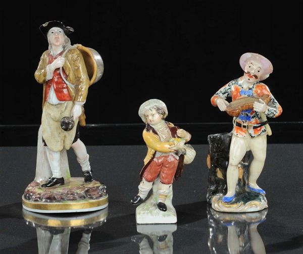 Lotto di tre figure in porcellana policroma di fogge e misure diverse, Germania e Italia, XIX secolo