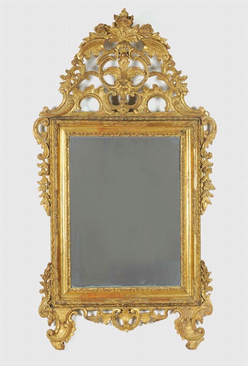 Specchiera Luigi XIV in legno intagliato e dorato, XVIII secolo  - Asta Antiquariato e Dipinti Antichi - Cambi Casa d'Aste