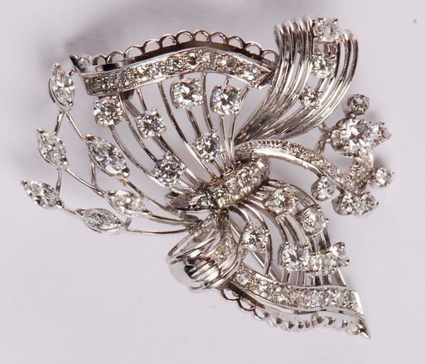 A gold and diamond brooch