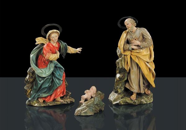 Quattro statuine da presepe in legno intagliato, inizio XVIII secolo