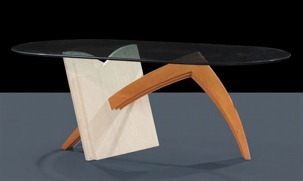 Tavolo ovale in materiali vari; travertino, legno e cristallo, Cattelan Italia