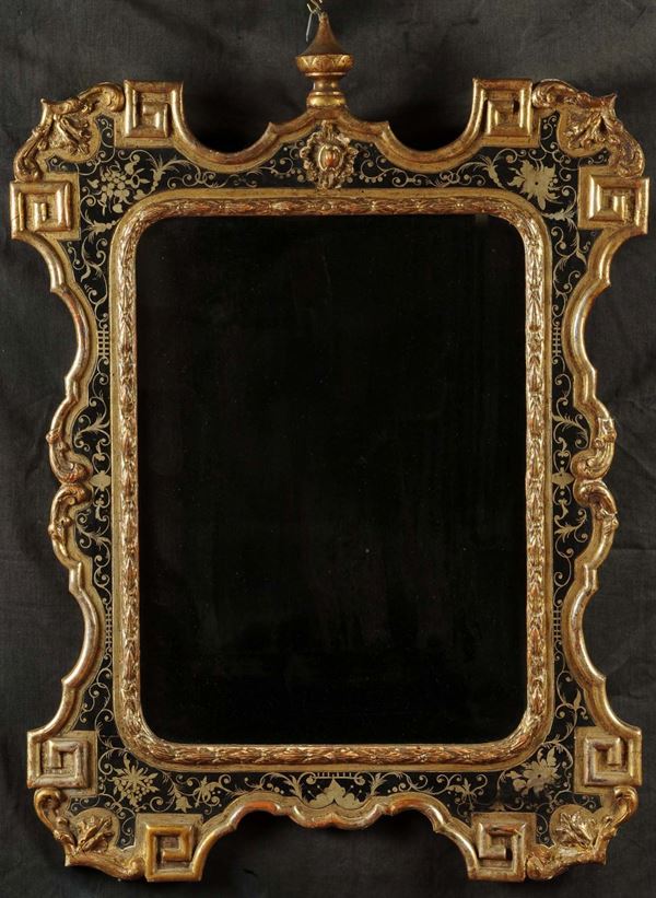 Specchiera in legno intagliato, laccato e dorato, XIX secolo