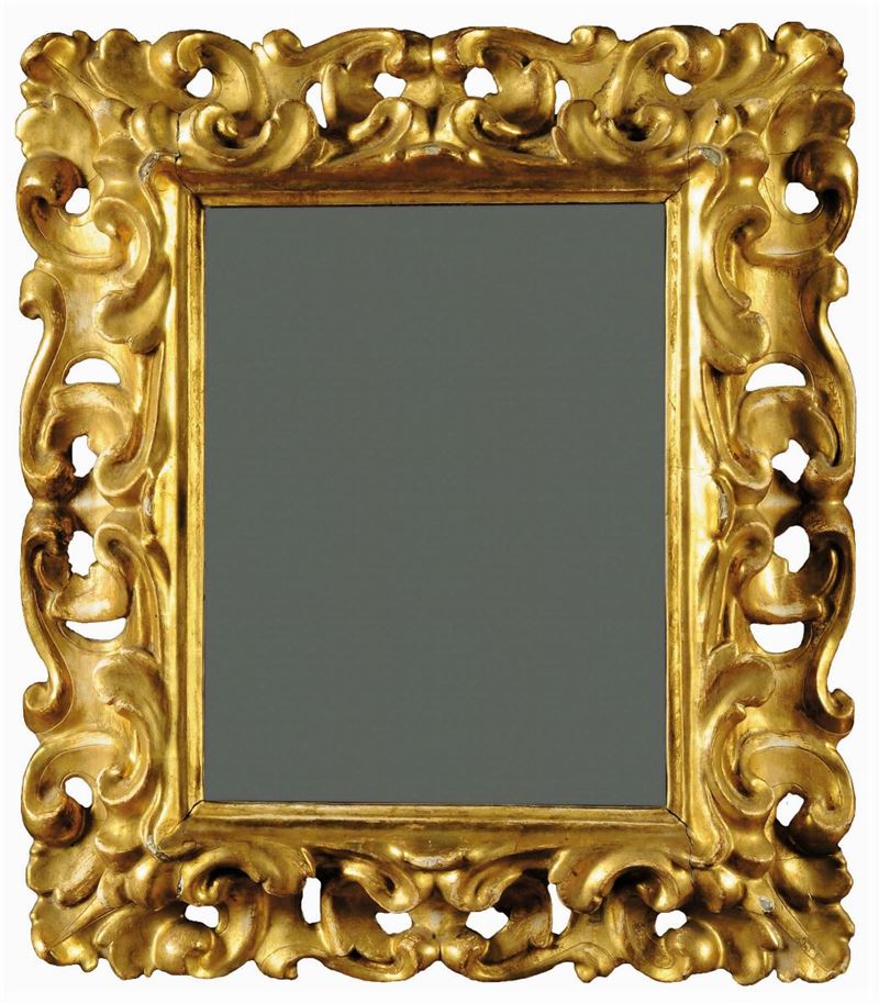Specchiera in legno intagliato a volute e dorato, Toscana XVII secolo  - Asta Antiquariato e Dipinti Antichi - Cambi Casa d'Aste