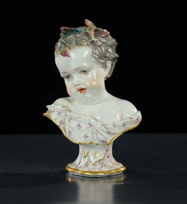 Bustino di fanciullo in porcellana policroma di Meissen, XIX secolo