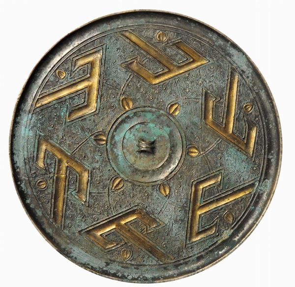 Specchio circolare in metallo, riferibile al periodo degli Stati Combattenti (475 a.C-221 a.C.)