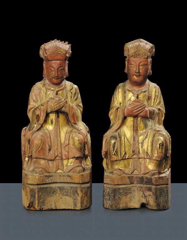 Coppia di statuette lignee dorate, Cina 1670