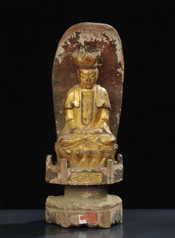 Buddha su fior di loto e aureola in legno dorato, 1610 circa