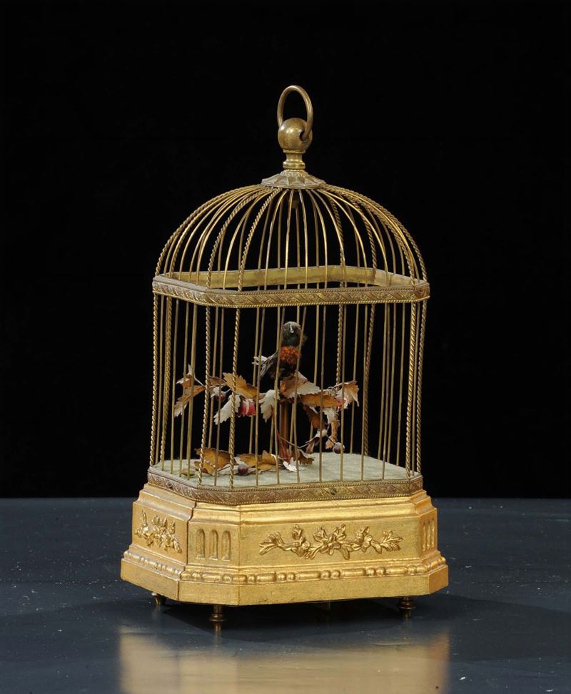 Gabbietta in metallo con uccellino meccanico che cinguetta  - Asta Antiquariato e Dipinti Antichi - Cambi Casa d'Aste