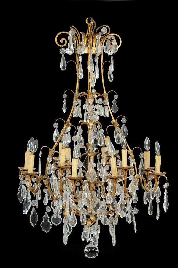 Lampadario in ferro dorato e cristalli a dodici luci, XX secolo