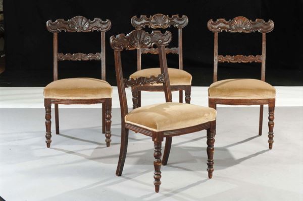 Quattro sedie tipo Peters in noce intagliato, XIX secolo