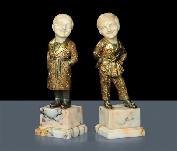 Coppia di statuine Deco in avorio e bronzo