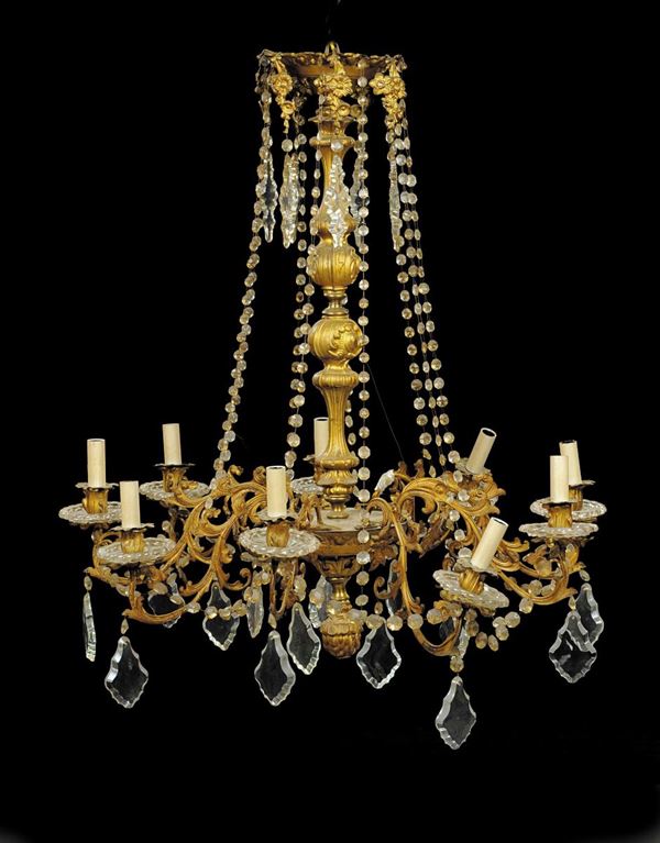 Lampadario a nove luci in lamierino dorato e cristalli, XIX secolo