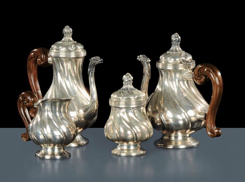 Servizio di quattro pezzi in argento di gusto barocco, XX secolo  - Asta Gioielli, Argenti ed Orologi Antichi e Contemporanei - Cambi Casa d'Aste