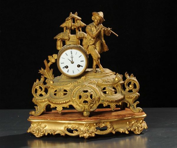 Orologio in metallo dorato, XIX secolo