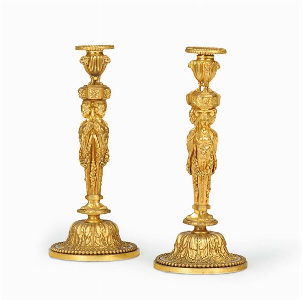 Coppia di candelieri in bronzo dorato, XIX secolo