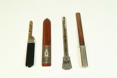 Quattro Tagliacarte Diversi in Legno e Argento