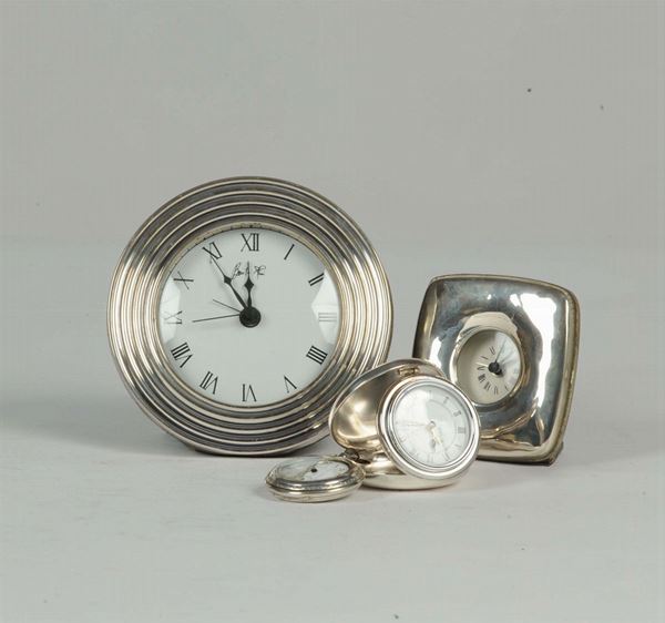 Quattro orologi in argento differenti, XX secolo