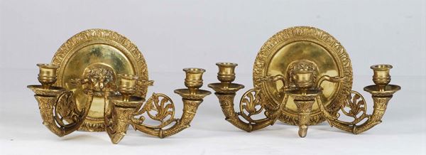 Coppia di appliques in bronzo a tre luci di gusto Impero, Francia XIX secolo