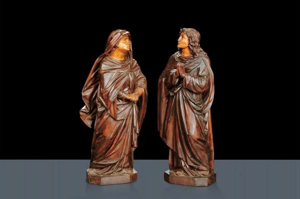 Coppia di sculture in legno intagliato raffiguranti Madonna e San Giovanni, XX secolo
