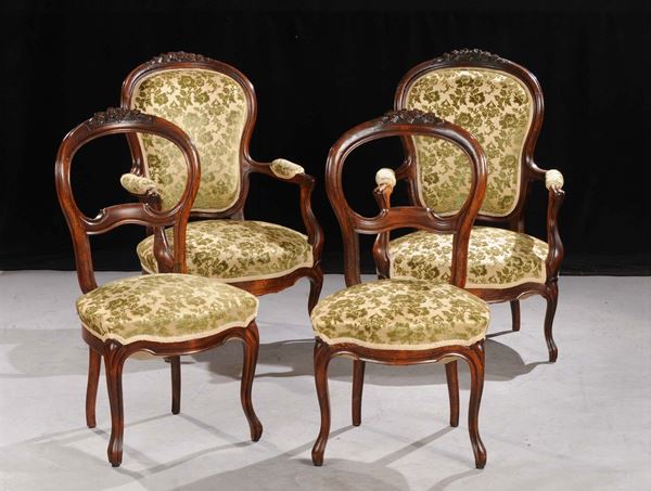 Due poltrone e due sedie Luigi Filippo in noce, XIX secolo