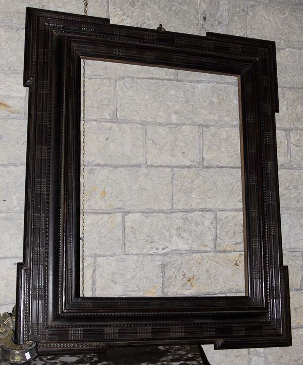 Cornice in legno ebanizzato