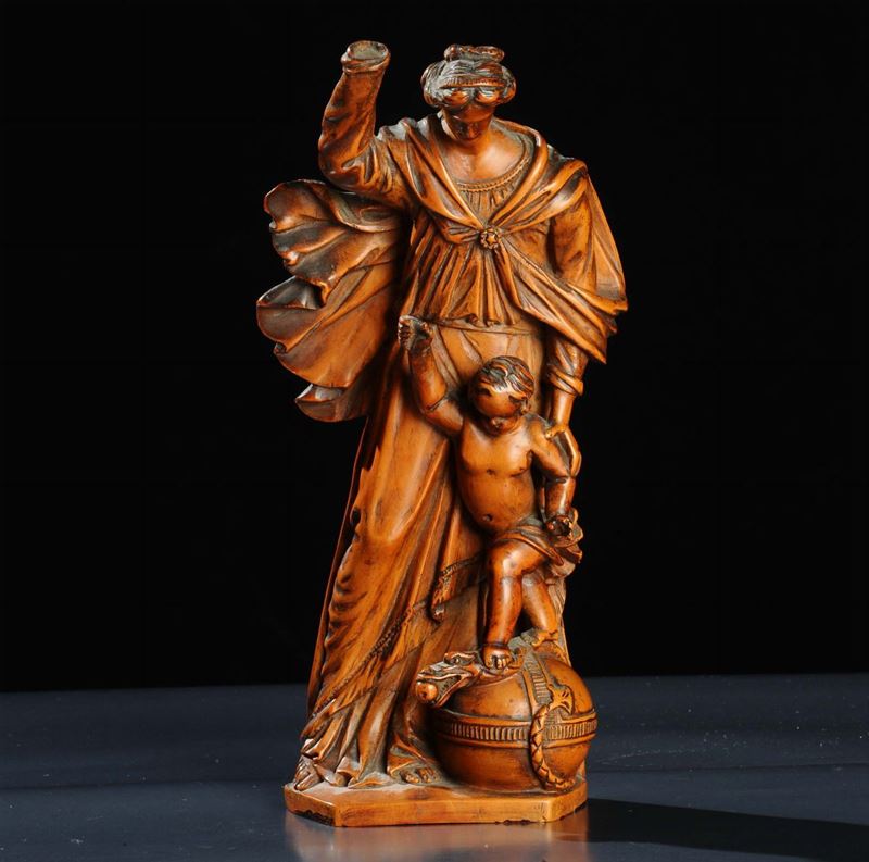 Scultura in legno di bosso raffigurante la Giustizia che schiaccia l'inganno, XX secolo  - Asta Antiquariato e Dipinti Antichi - Cambi Casa d'Aste