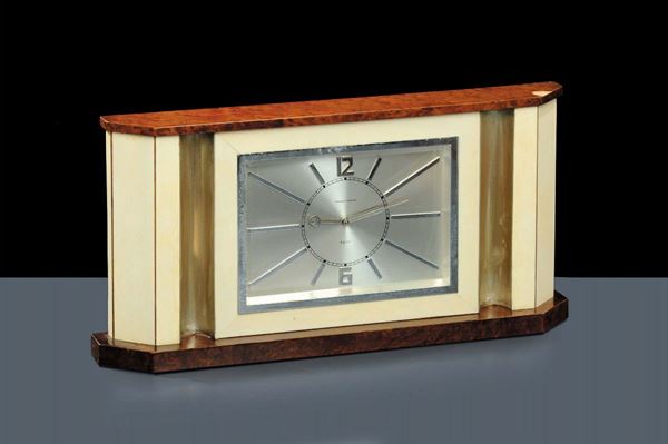 Orologio in legno e argento, anni Ô40