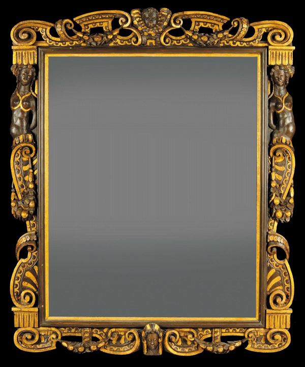 Cornice tipo Sansovina in noce con dorature, XVIII secolo