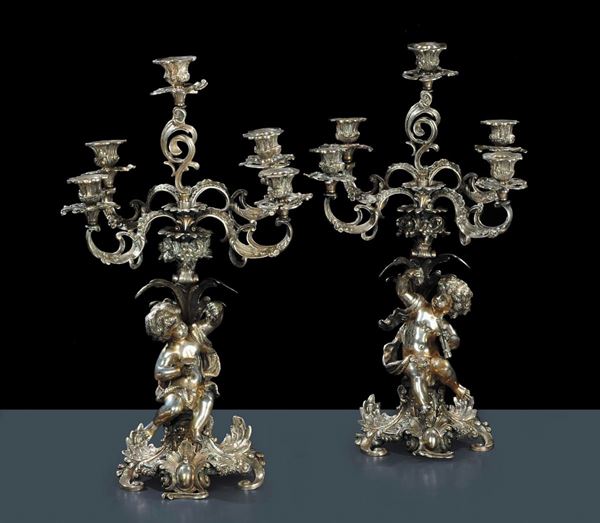 Coppia di candelabri in argento a cinque luci, inizio XX secolo