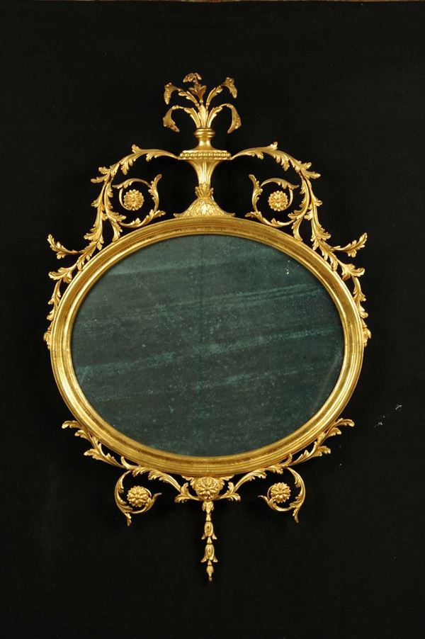 Specchio ovale dorato in stile Luigi XVI, fineXIX secolo