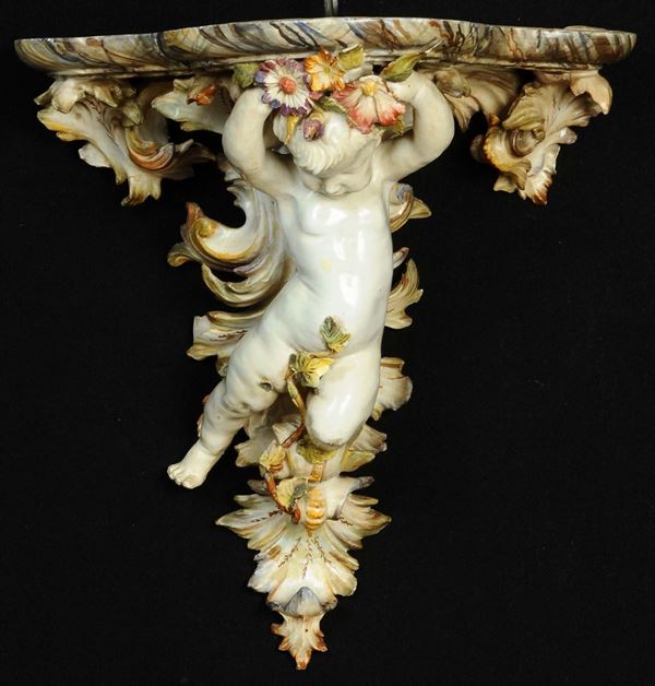 Mensola in maiolica con putto Nove di Bassano, fine XIX secolo
