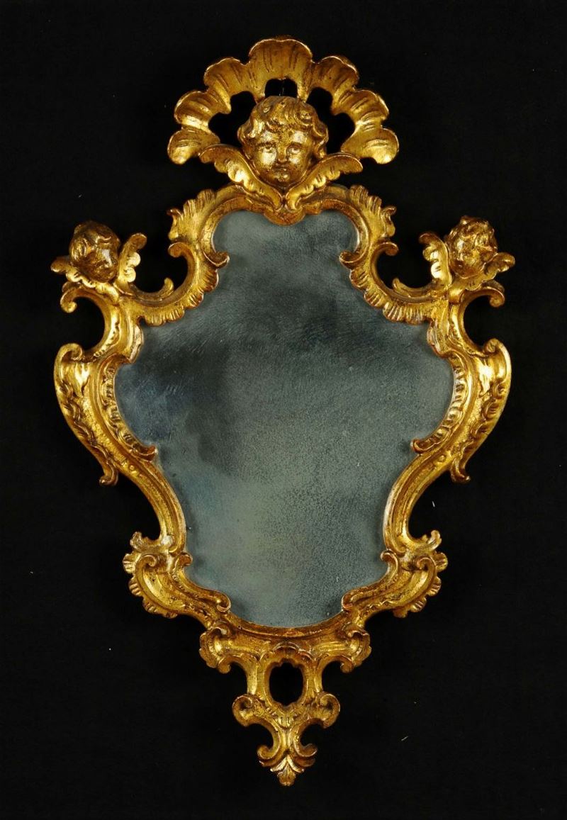 Specchierina in legno intagliato e dorato, XVIII secolo  - Asta Asta OnLine 12-2011 - Cambi Casa d'Aste