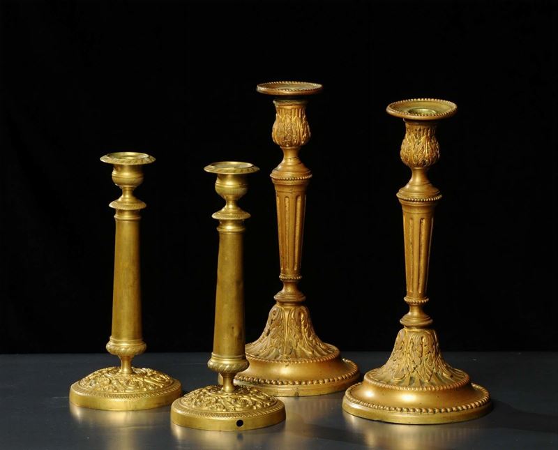 Due coppie di candelieri in metallo dorato, XX secolo  - Auction Antiquariato, Argenti e Dipinti Antichi - Cambi Casa d'Aste