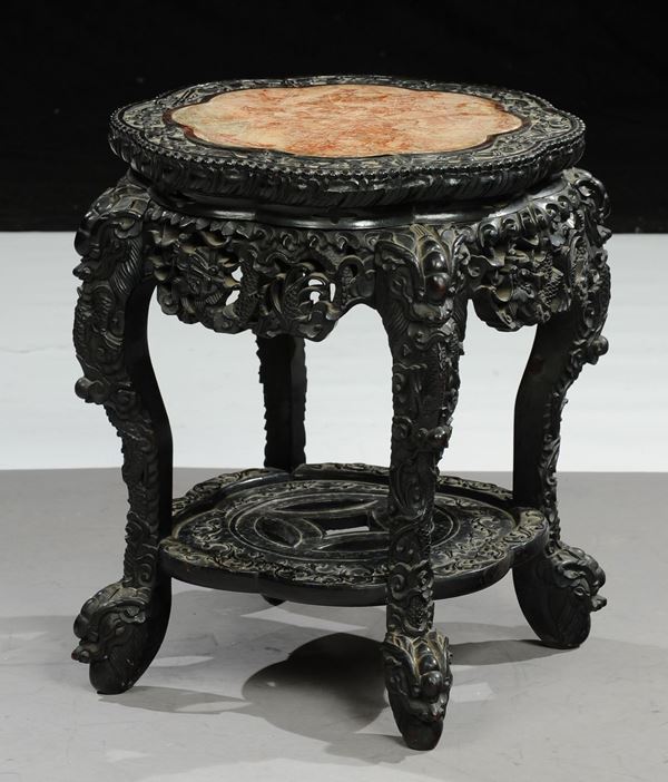 A small Chinese homu wood table with marble top, China, 20th centuryebonised and carved wood