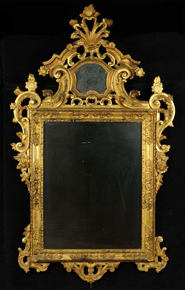 Specchiera in legno intagliato e dorato, XIX secolo