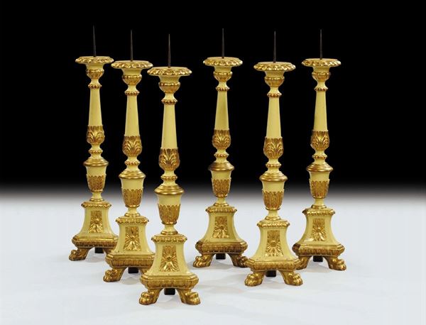 Sei candelieri in legno intagliato dorato e laccato, XIX secolo