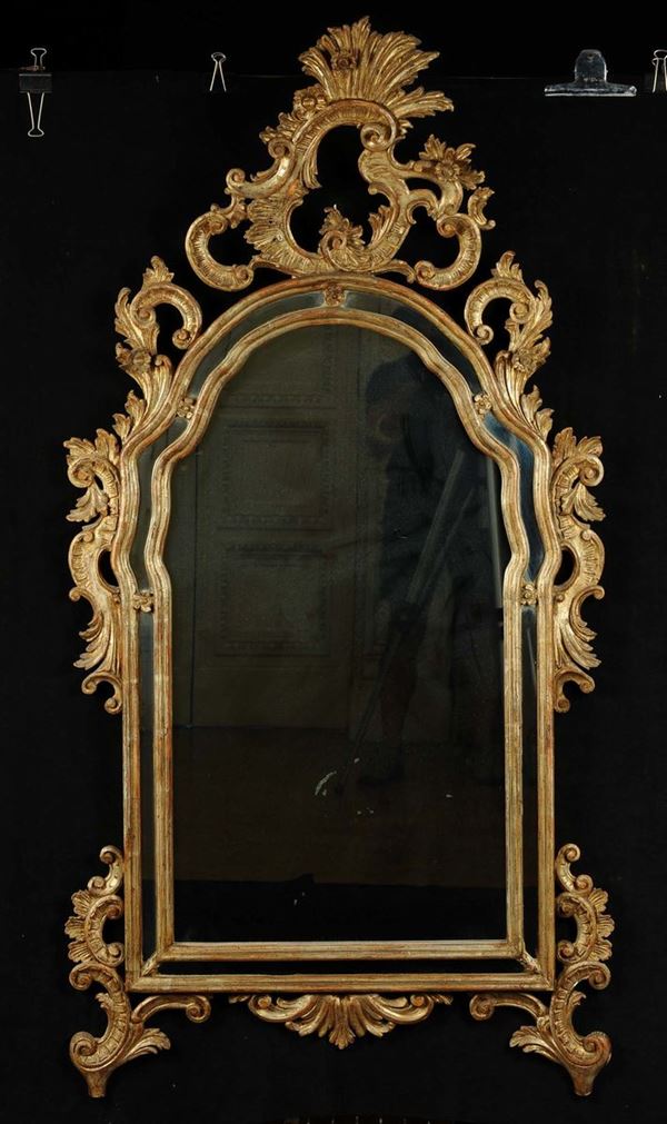 Specchiera in stile Luigi XIV intagliata e dorata, XX secolo