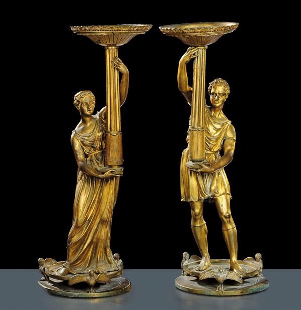 Coppia di sculture in bronzo dorato raffiguranti personaggi, Francia XIX secolo